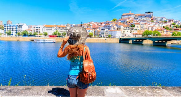 Traveler woman visiting Coimbra city in Portugal
