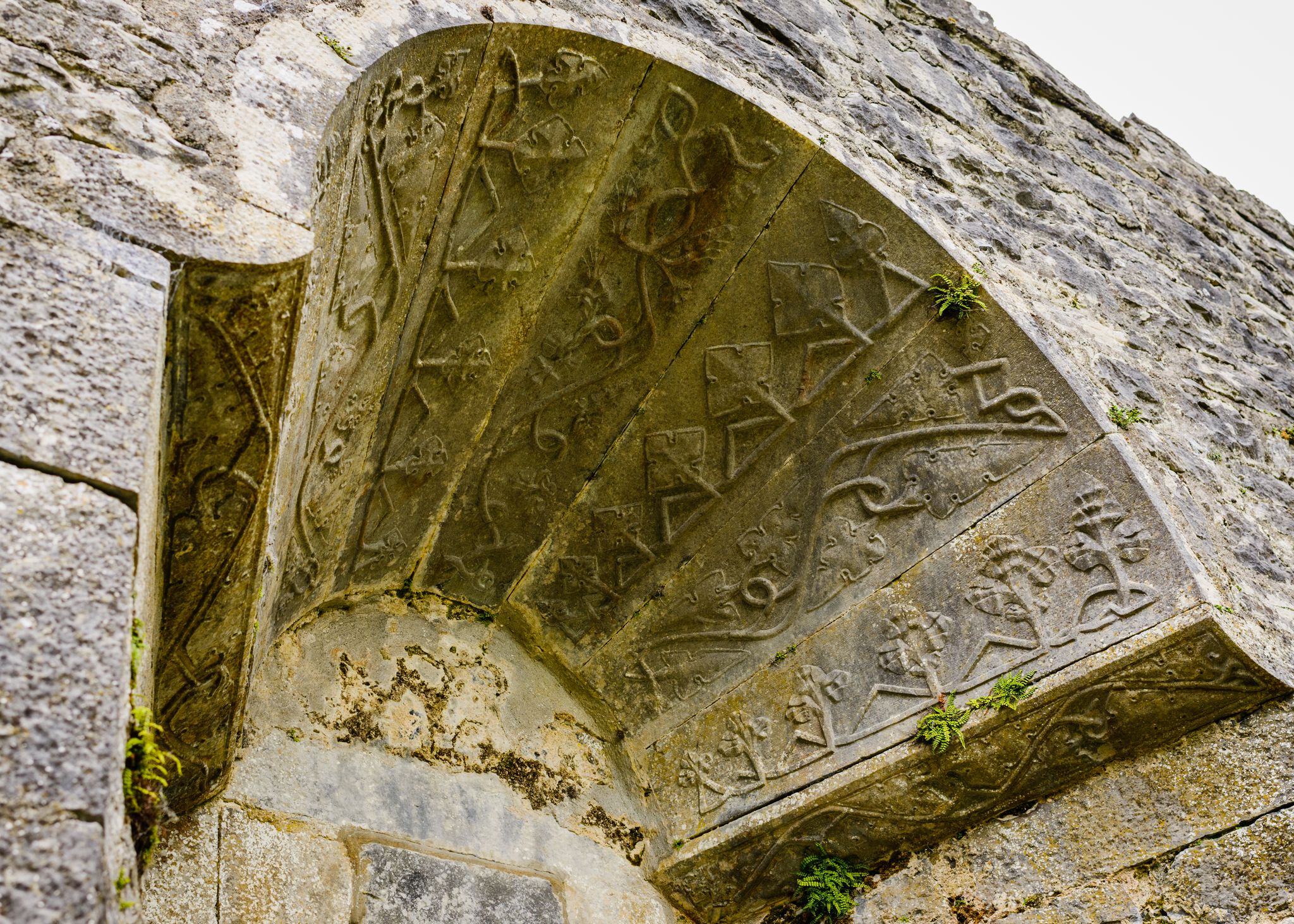 photo of view of A medieval arch over a window at Aughnanure Castle in Co. Galway, Irland.