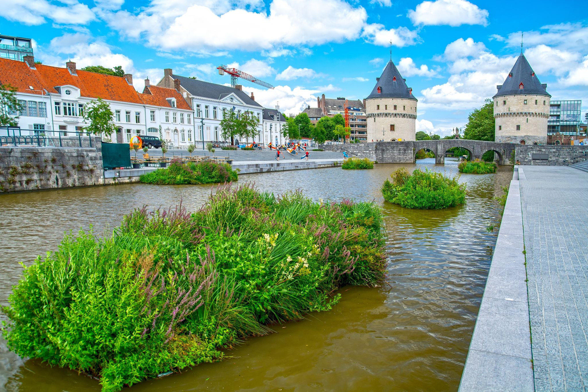 photo of view of Stock Photo ID: 2034077369  Broel Towers along the river Lys in Kortrijk, West Flanders, Belgium
