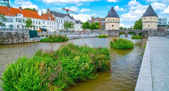 photo of view of Stock Photo ID: 2034077369  Broel Towers along the river Lys in Kortrijk, West Flanders, Belgium