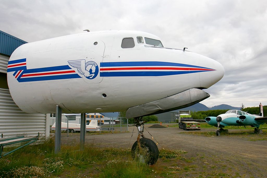 photo of view of Some nice old aircraft can be found in the backyard of AEY. With Flugfelag Islands markings, Akureyri, Iceland.