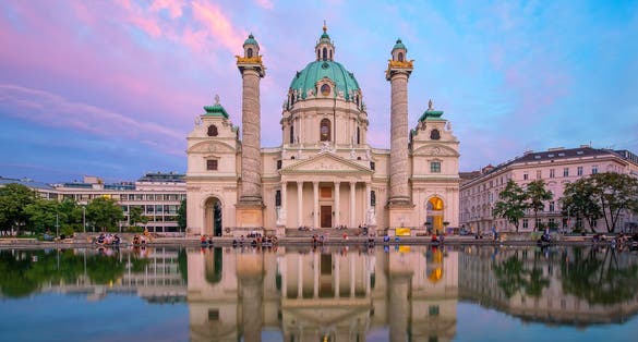 Photo of St. Charles's Church (Karlskirche) in Vienna, Austria at beautiful twilight.
