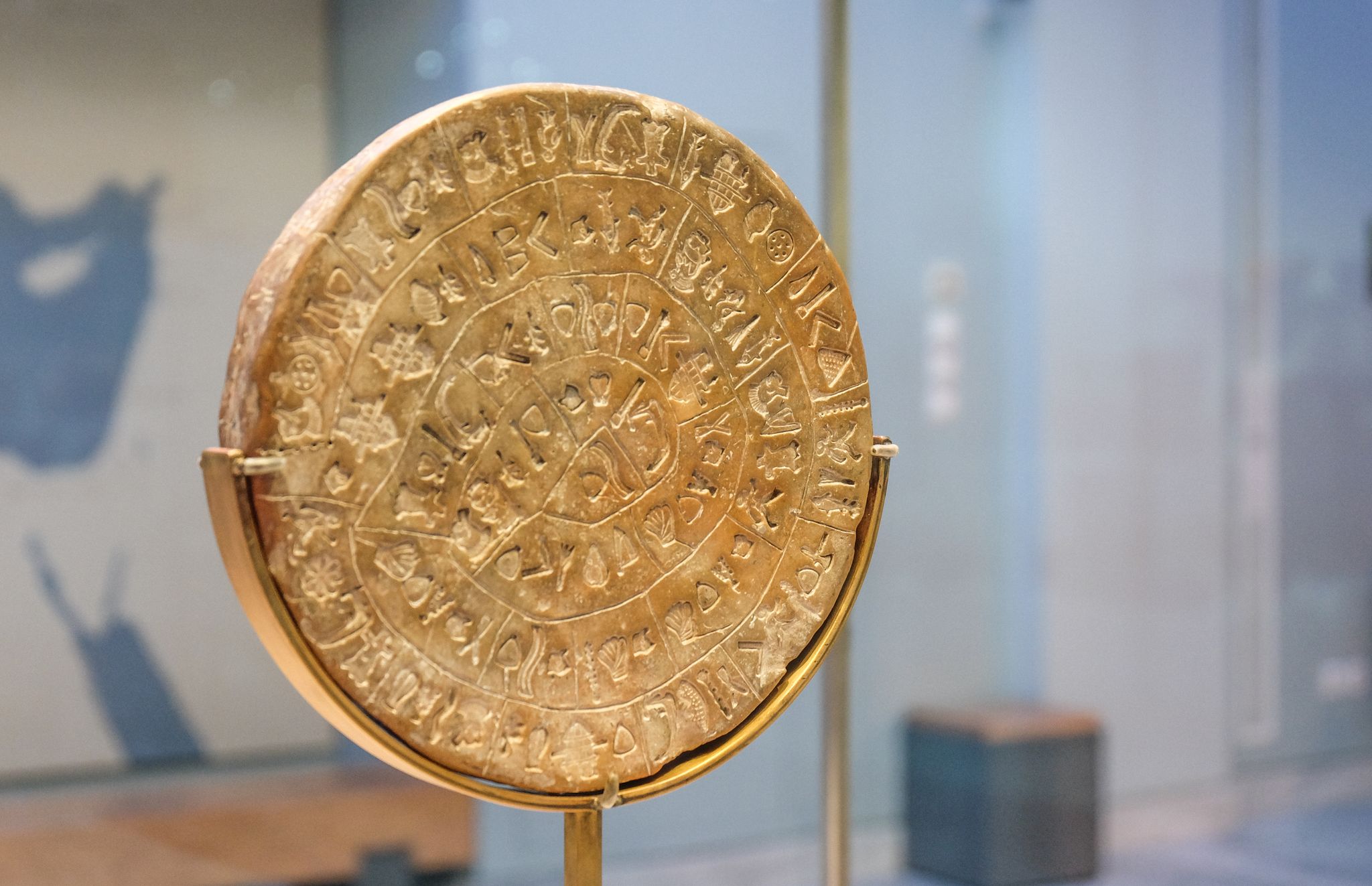 photo of Ancient, historical, greek hieroglyph disk, Heraklion, Greece.