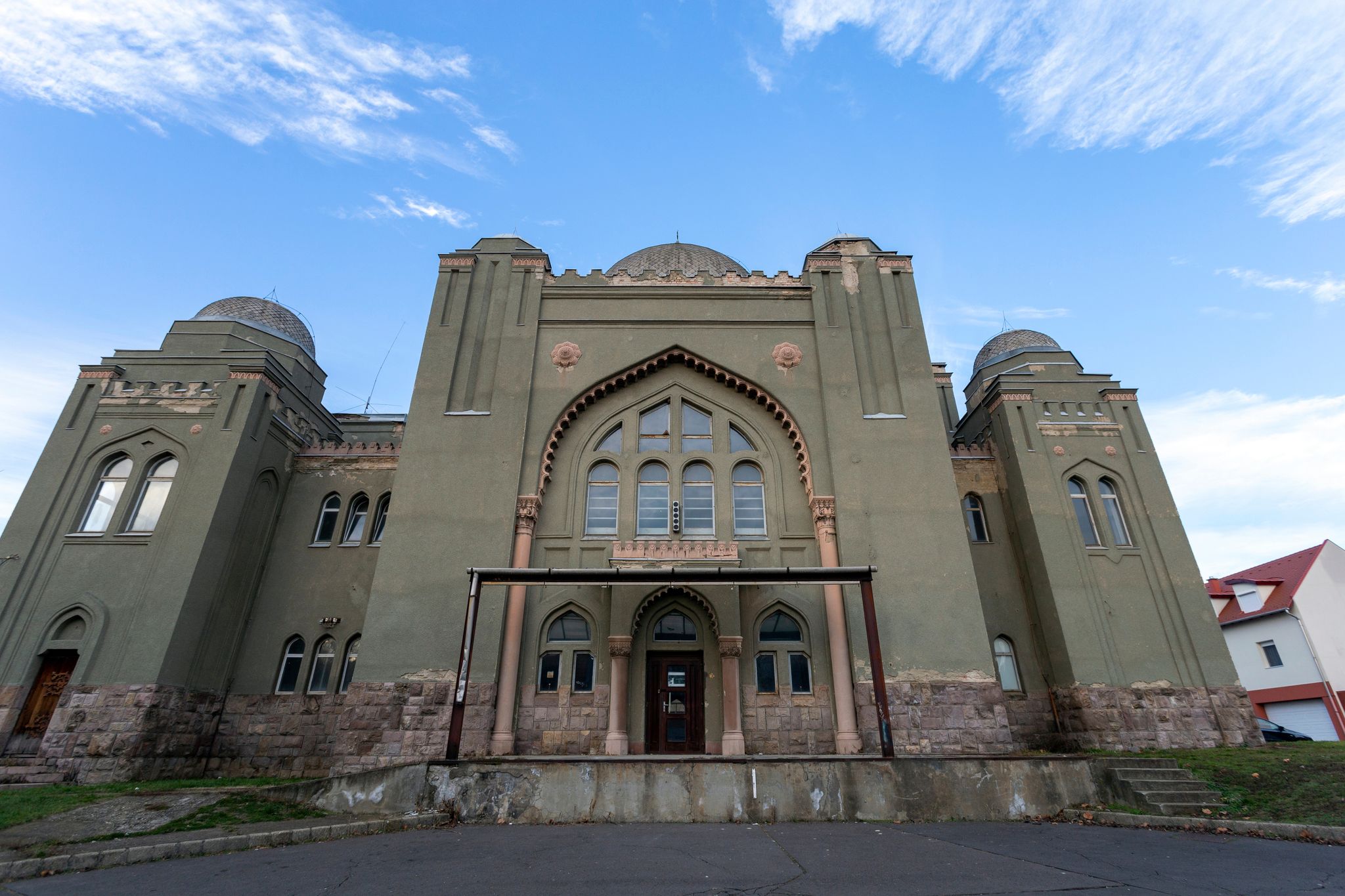 photo of view of Synagogue in Gyongyos, Hungary on a winter evening.