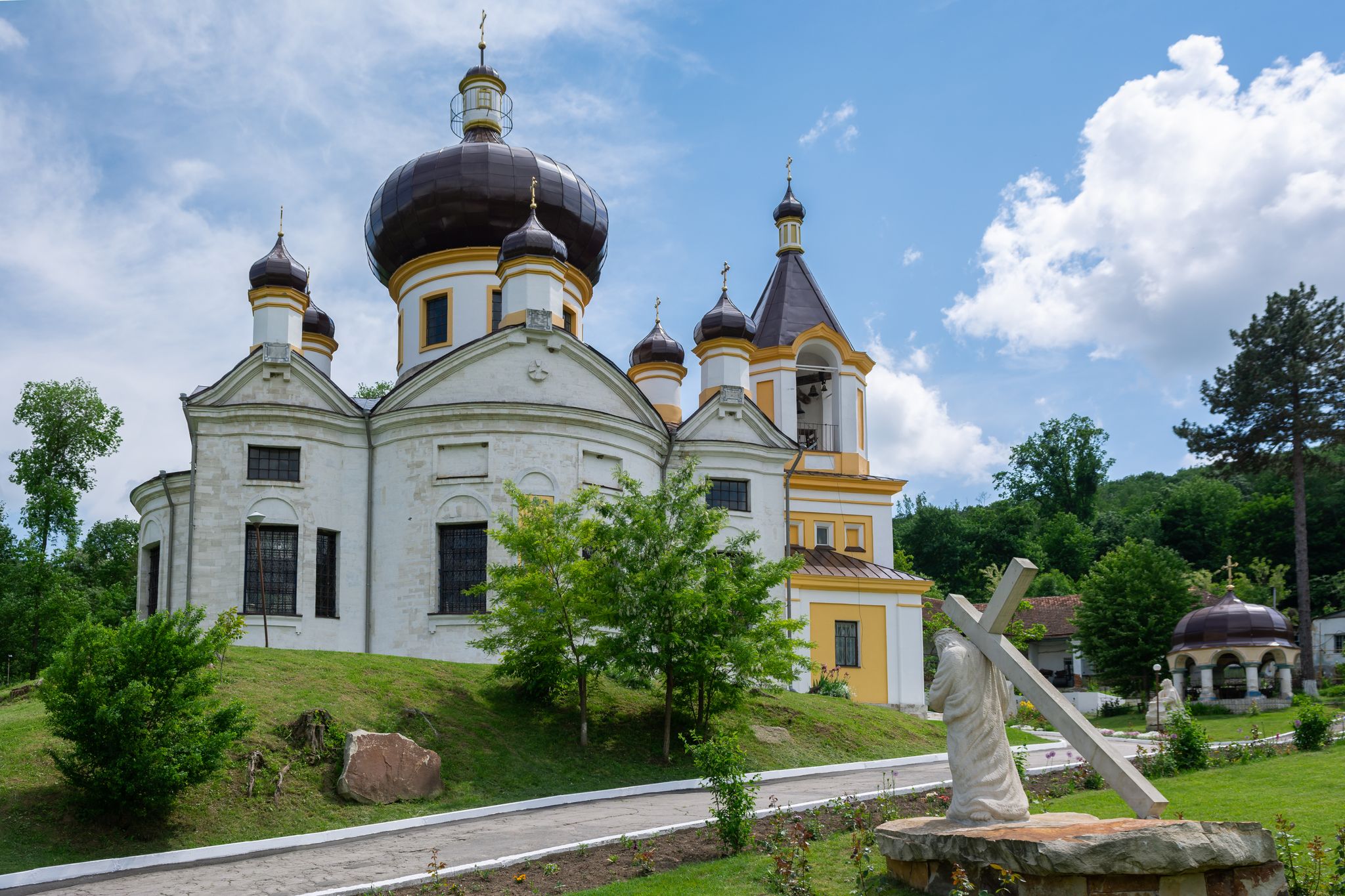 Photo of Cathedral of Saint Nicholas in Condrita Monastery with Sculpture of Jesus Christ carrying the cross, Republic of Moldova.