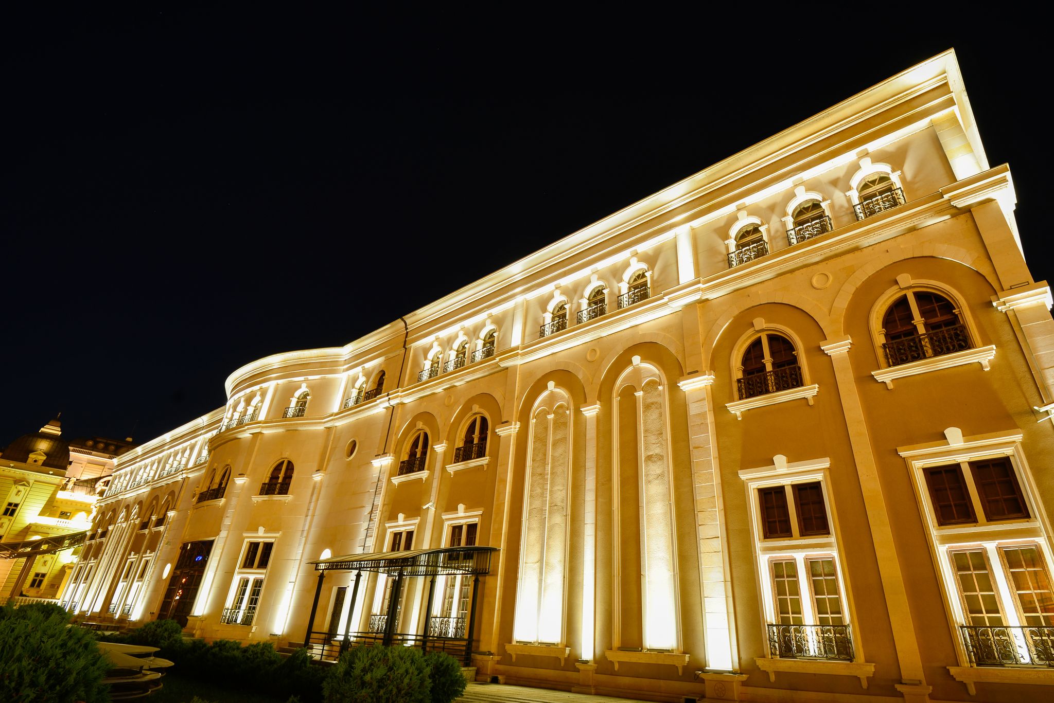 Photo of beautiful view of Museum of the Macedonian Struggle building at night in Skopje, Macedonia.