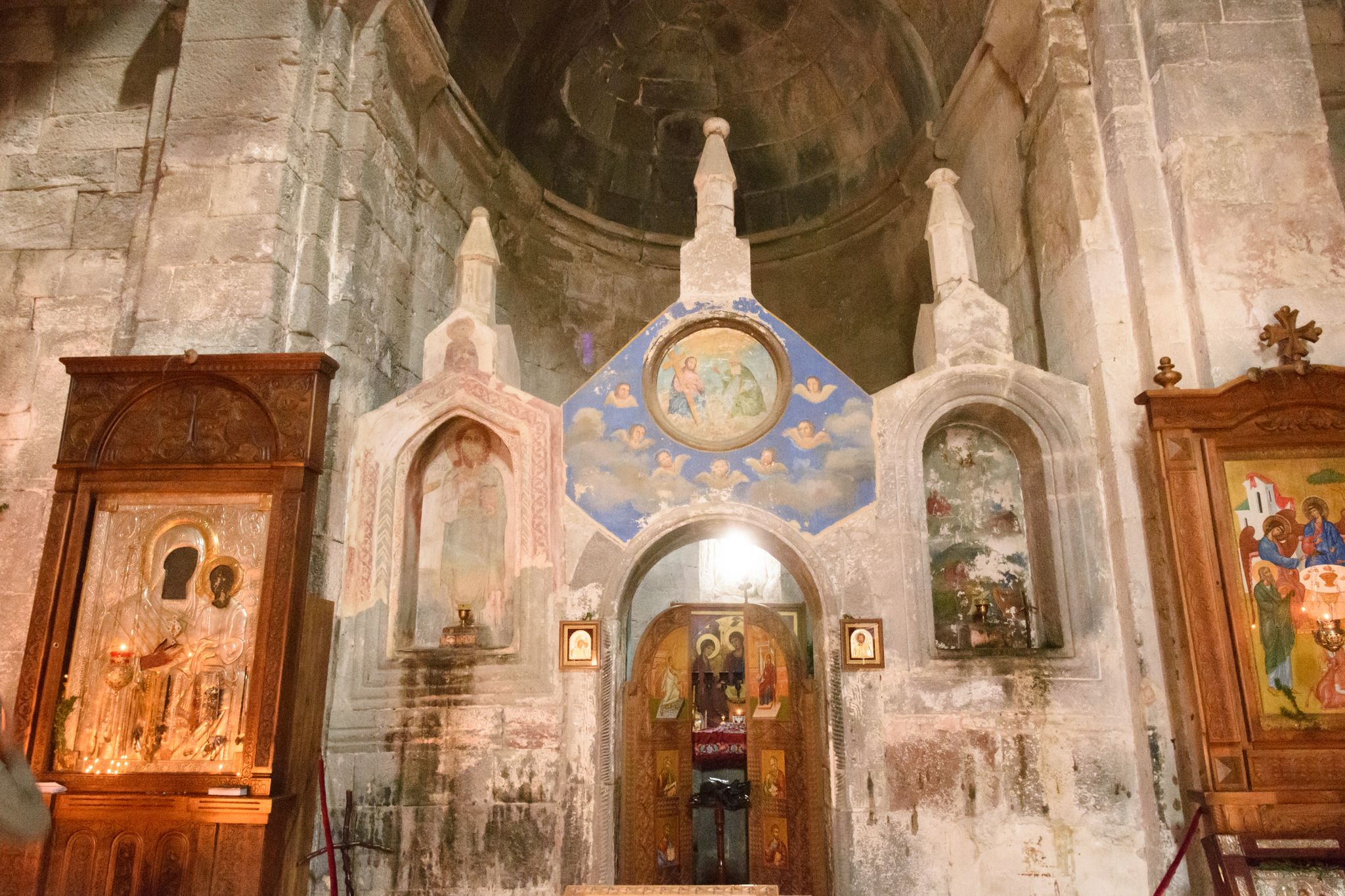 Photo of Interior of Church of Holy Trinity in Gergeti monastery. Face of Saint Mary from miraculous icon of Our Lady of Gergeti.