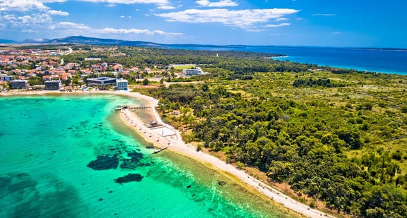 Novalja, Pag island. Idyllic beach and turquoise sea aerial view in town of Novalja, Adriatic archipelago of Croatia