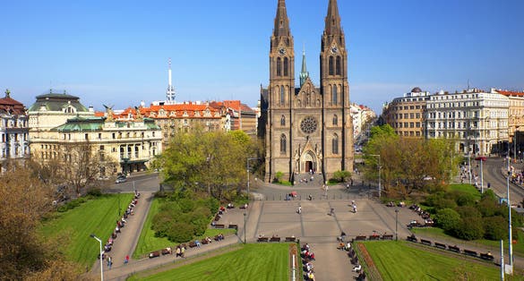 Photo of aerial view of Peace Square (Namesti Miru) Vinohrady Quarter, Vinohrady Theatre and the Cathedral of St. Ludmila at the district of Vinohrady, Prague, Czech Republic.