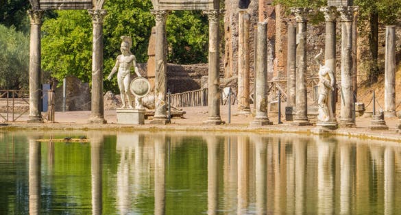 The ancient pool called Canopus, surrounded by greek sculptures in Hadrian's Villa, Tivoli, Italy