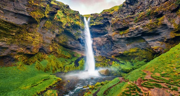 photo of view from flying drone of Kvernufoss watterfall. Amazing summer scene of pure water river in Iceland, Europe. Beauty of nature concept background.