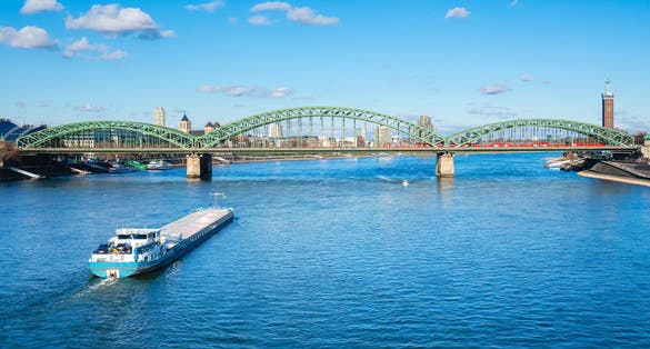 Photo of Cologne Koln, Germany, Panorama view of the Rhine River with Hohenzollernbrücke.