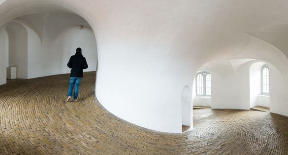 Photo of tourist Walking in Rundetaarn, Copenhagen, Denmark.