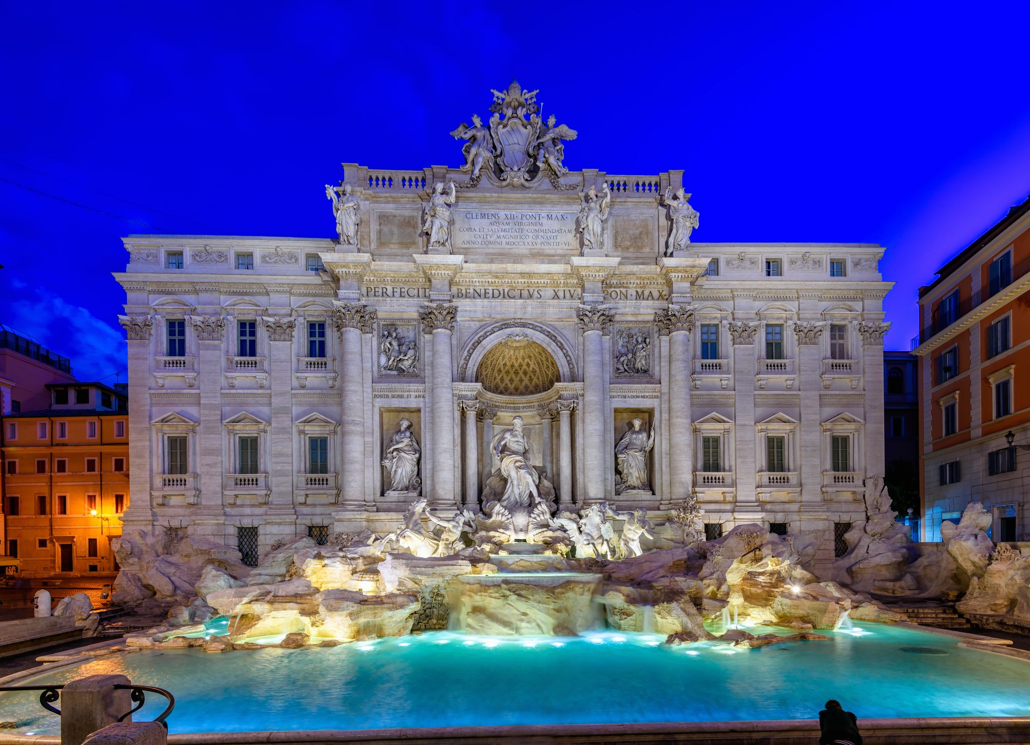 photo of night view of Rome trevi fountain (Fontana di trevi) in Rome, Italy. Trevi is most famous fountain of Rome. Architecture and landmark of Rome.