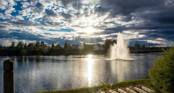 photo of view of Fountain at Glomma river in Elverum in Norway, Scandinavia.