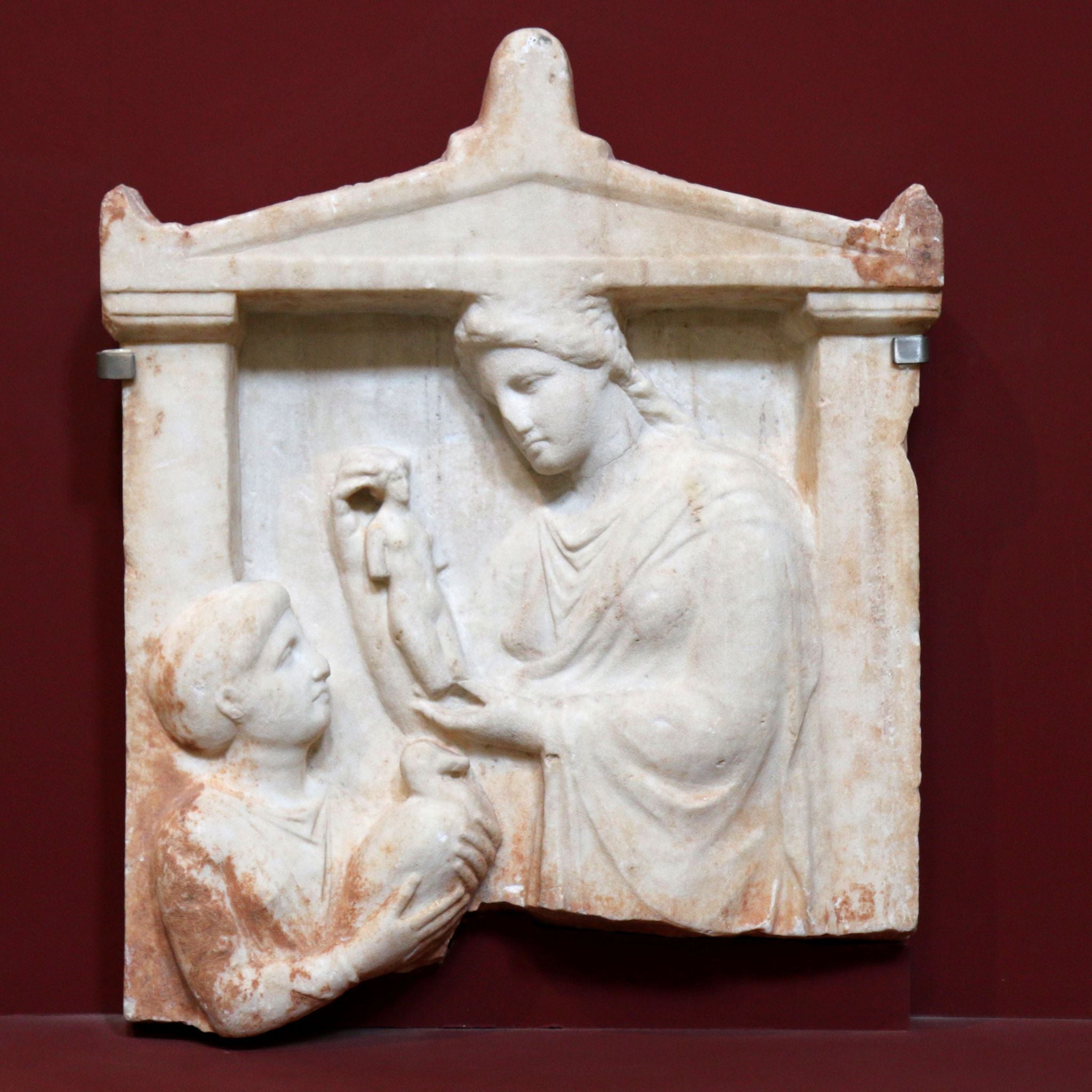 Funerary stele of a young girl.