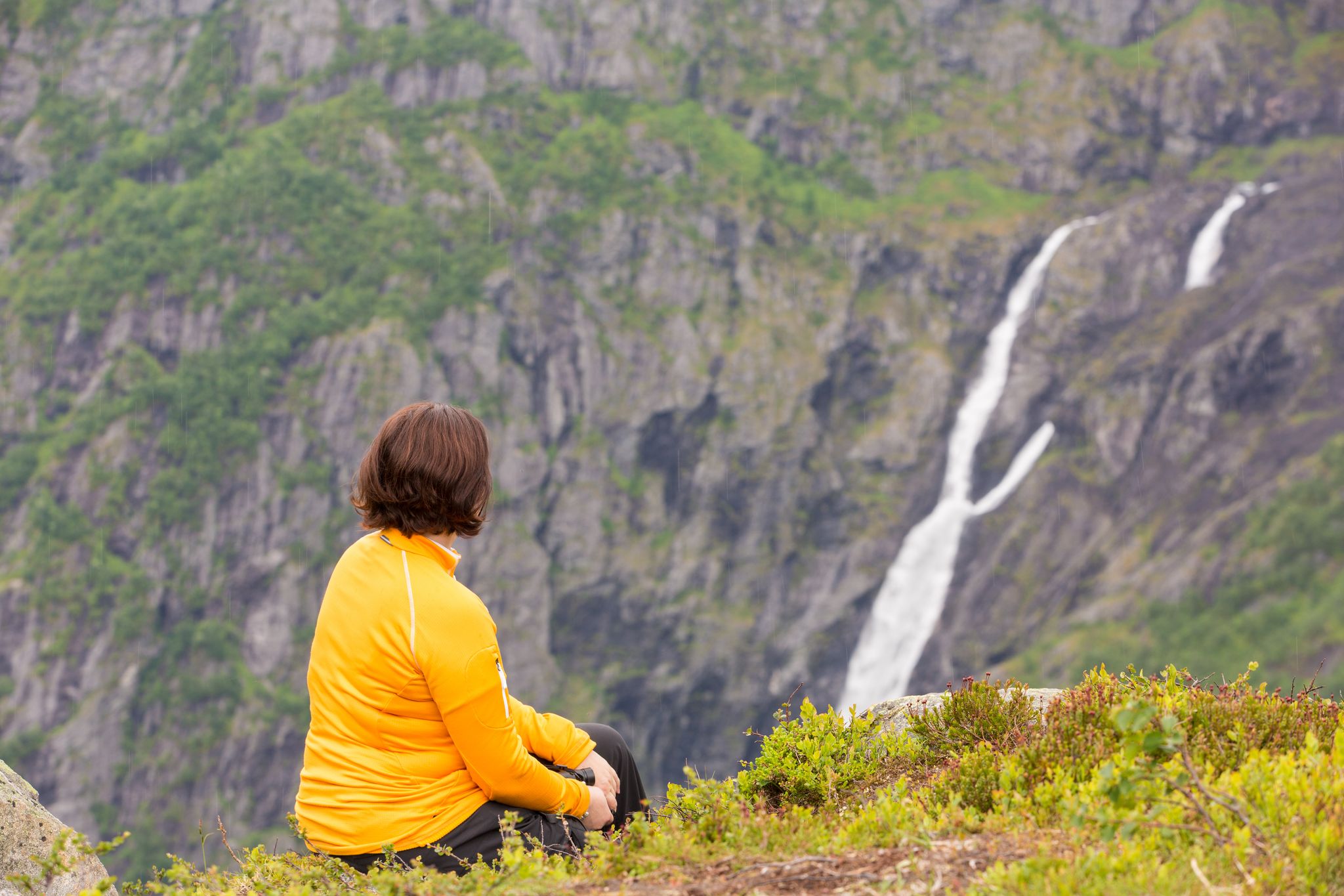 Relaxation and meditation in the mountains overlooking the wonderful waterfall.