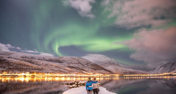 Romantic aurora borealis in Tromso (Norway)