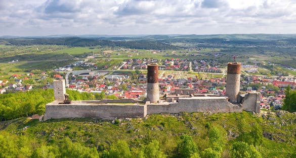 photo of aerial drone view, scenic summer evening landscape of Chęciny Castle (Kielce County, Świętokrzyskie Voivodeship) in Poland.