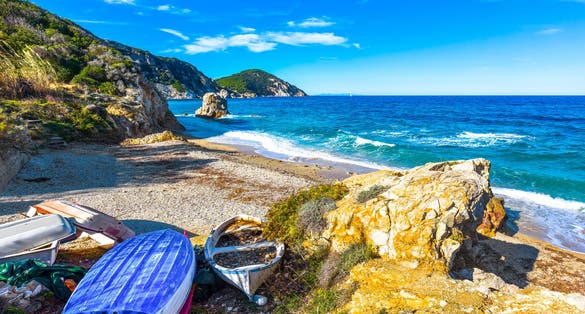 Elba island, Portoferraio Sansone la Sorgente beach coast and old boats. Tuscany, Italy, Europe. Long Exposure.