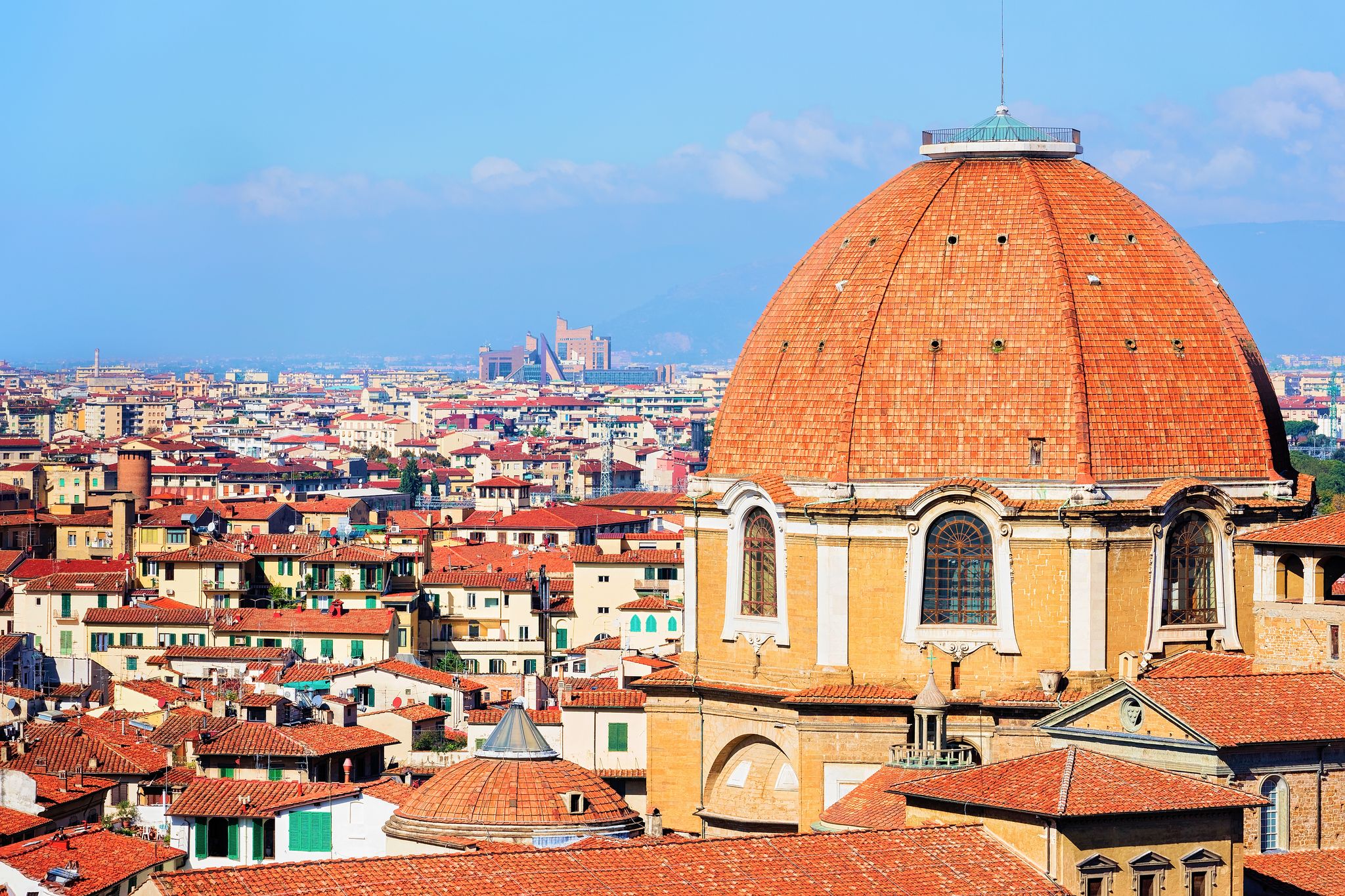 photo of Cityscape with Medici Chapel and the old town of Florence, Italy .