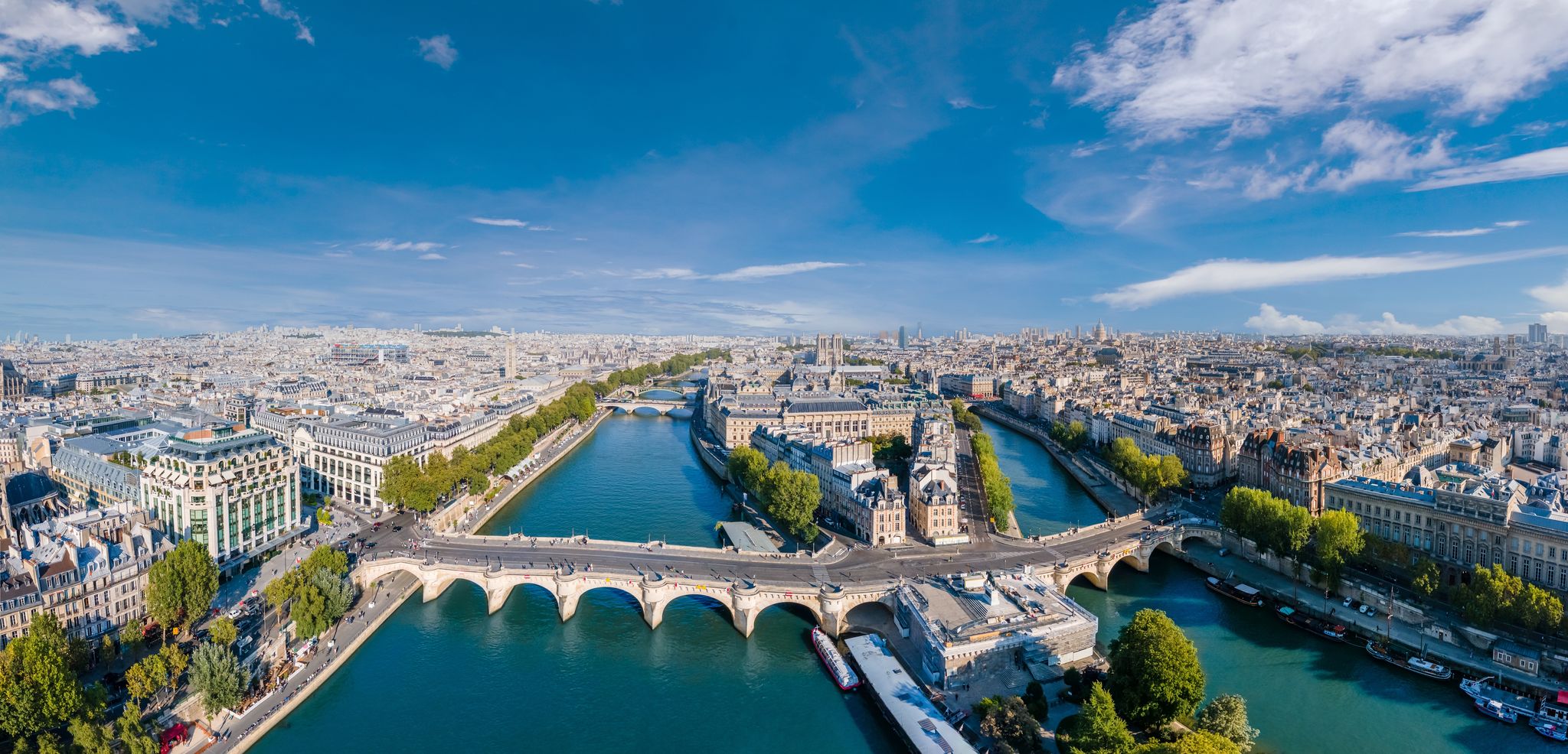 photo of aerial panorama view of river Seine and Pont Neuf bridge in Paris, France.