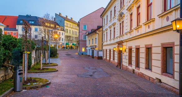 view of a narrow street in the austrian city villach