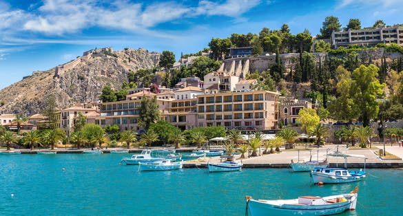 Photo of Greece, Nafplio in a beautiful summer day with white fishing boats.