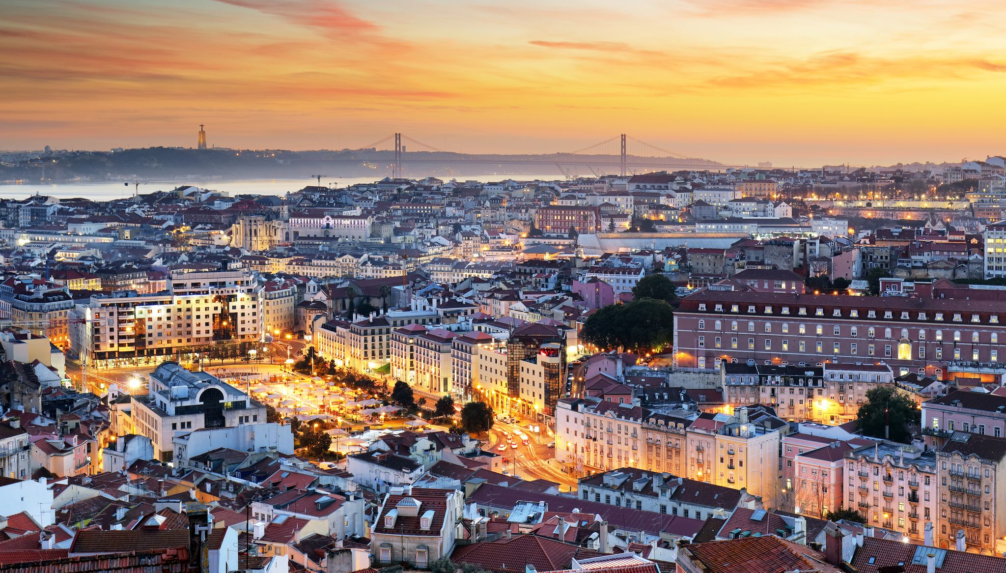 Photo of Lisbon City Skyline with Sao Jorge Castle and the Tagus River, Portugal.