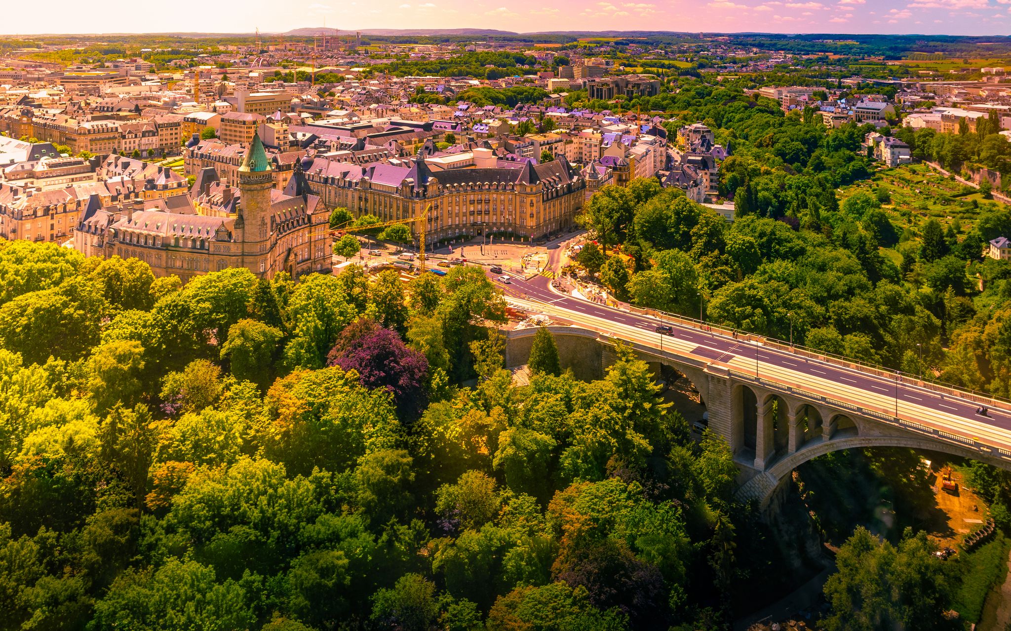 photo of panoramic aerial view of adolph bridge, Fort burbon and musee de la banque in luxembourg on a beautiful summer day, Luxembourg.