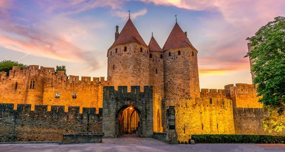 Photo of night view of Carcassone medieval city in France.