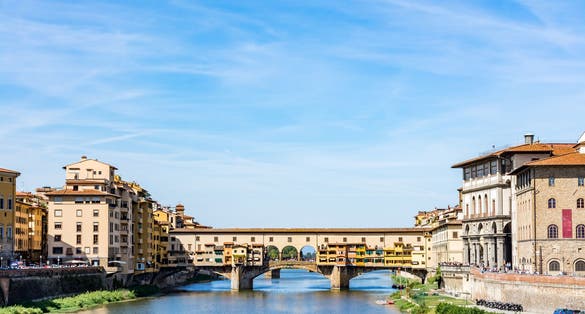 Photo of Ponte Vecchio, old bridge over Arno River, Florence, Tuscany, Italy.