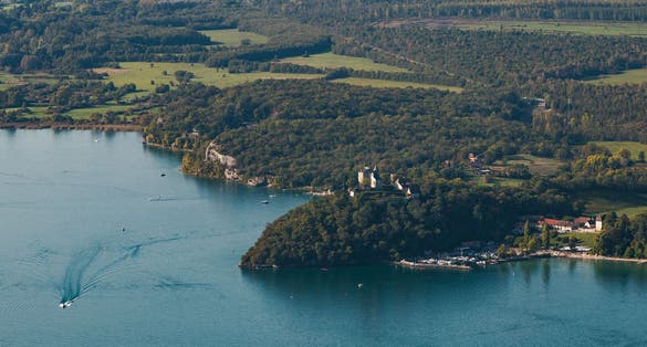 Panoramic viewpoint over Lake Bourget and Chateau de Chatillon from La Chambotte in Savoie.