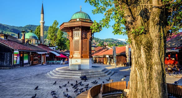 Bascarsija square with Sebilj wooden fountain in Old Town Sarajevo, capital city of Bosnia.