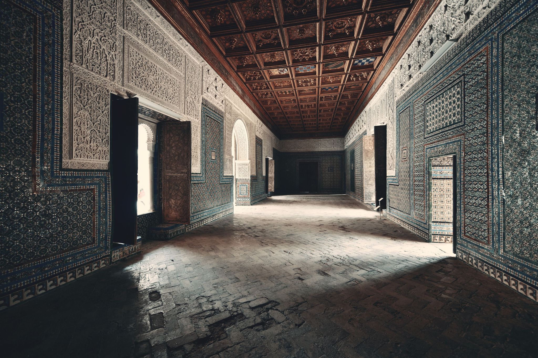 Photo of Casa de Pilatos interior view with beautiful patterns and decoration in Seville, Spain.