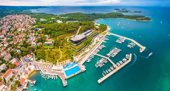 Photo of aerial view of town Rovinj scenic waterfront, famous tourist destination in Istria region of Croatia.