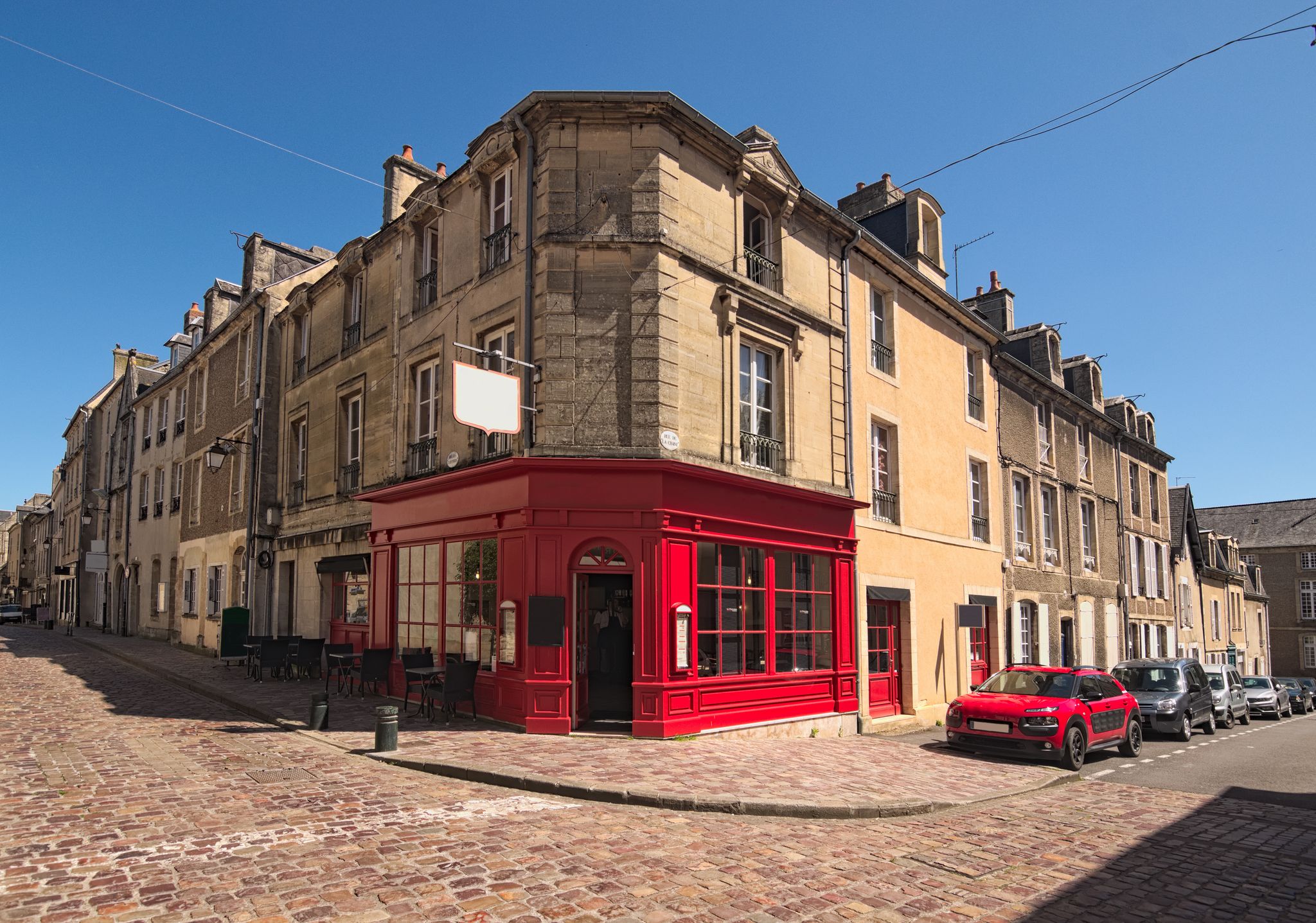 Photo of typical street corner in the medieval city of Bayeux, Calvados department of Normandy, France.