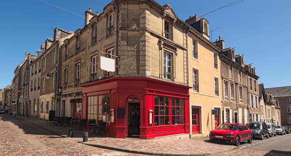Photo of typical street corner in the medieval city of Bayeux, Calvados department of Normandy, France.