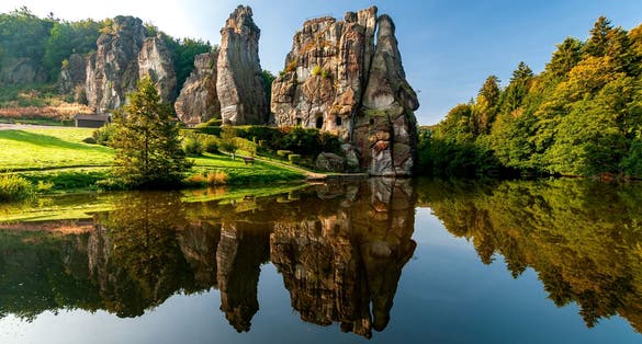 Photo of Famous rock formation Externsteine in the Teutoburg Forest  Bielefeld , Germany.