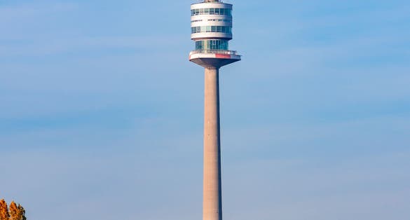 photo of view of Danube tower (Donauturm) in autumn, Vienna, Austria.