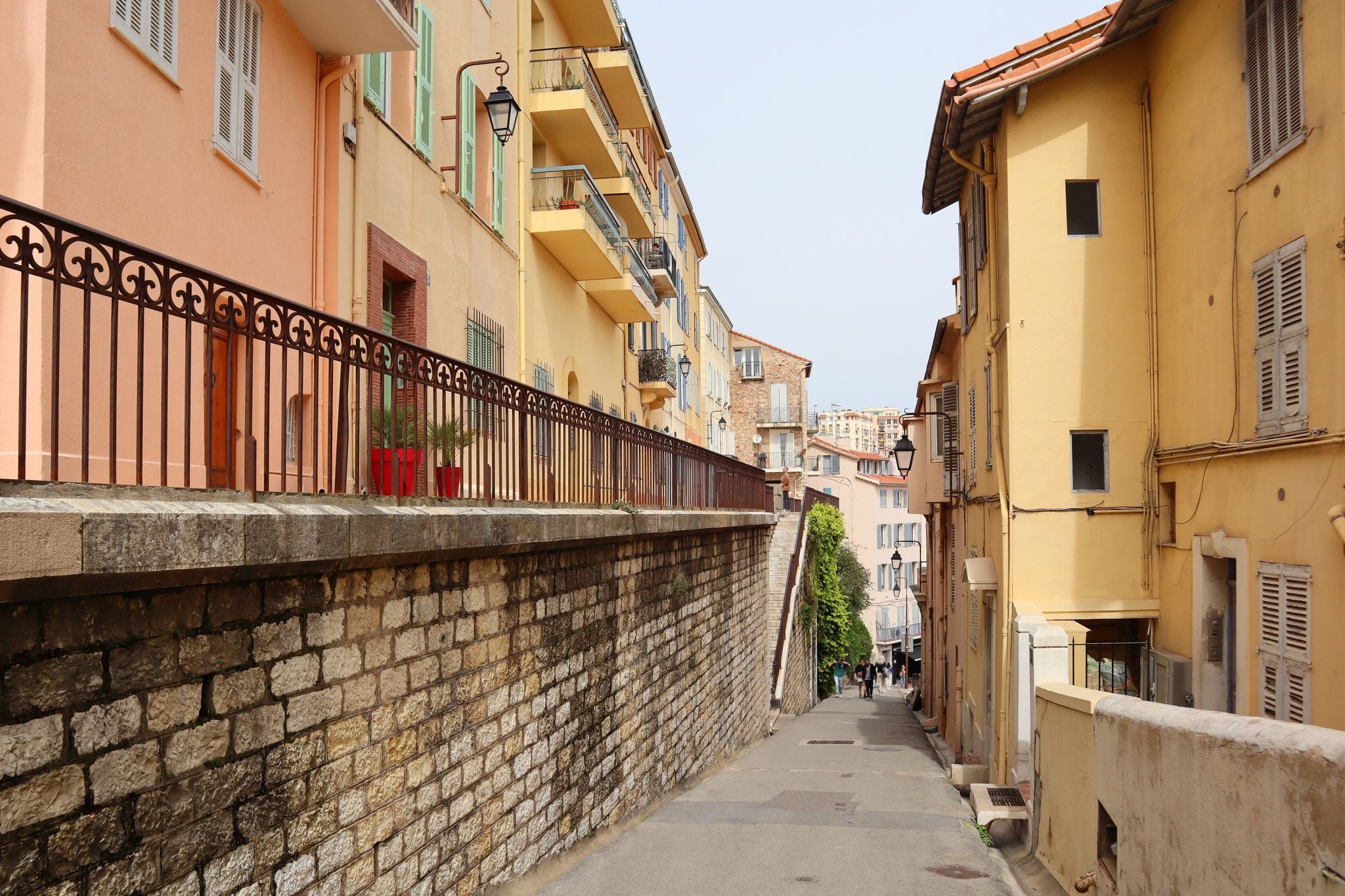 Photo of aerial cityscape view on French riviera with yachts in Cannes city, France.