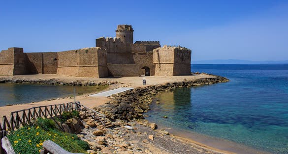 photo of view of Splendid view of Le Castella. Crotone, Calabria, Italy. June 10, 2017.