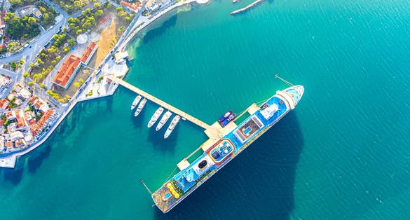Photo of big cruise liner ship near the pier. Argostoli, Kefalonia island, Greece.