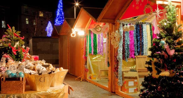 Photo of Continental Christmas Market in Eyre Square, Galway, at night time.