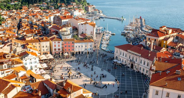 Beautiful aerial view on Piran town with Tartini main square, ancient buildings with red roofs and Adriatic sea in southwestern Slovenia