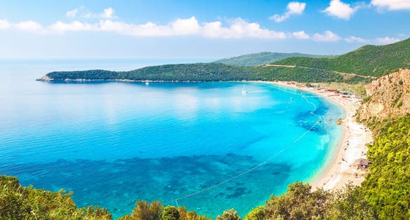 Photo of Summer morning Adriatic coastline landscape with Jaz beach (near Budva, Montenegro).