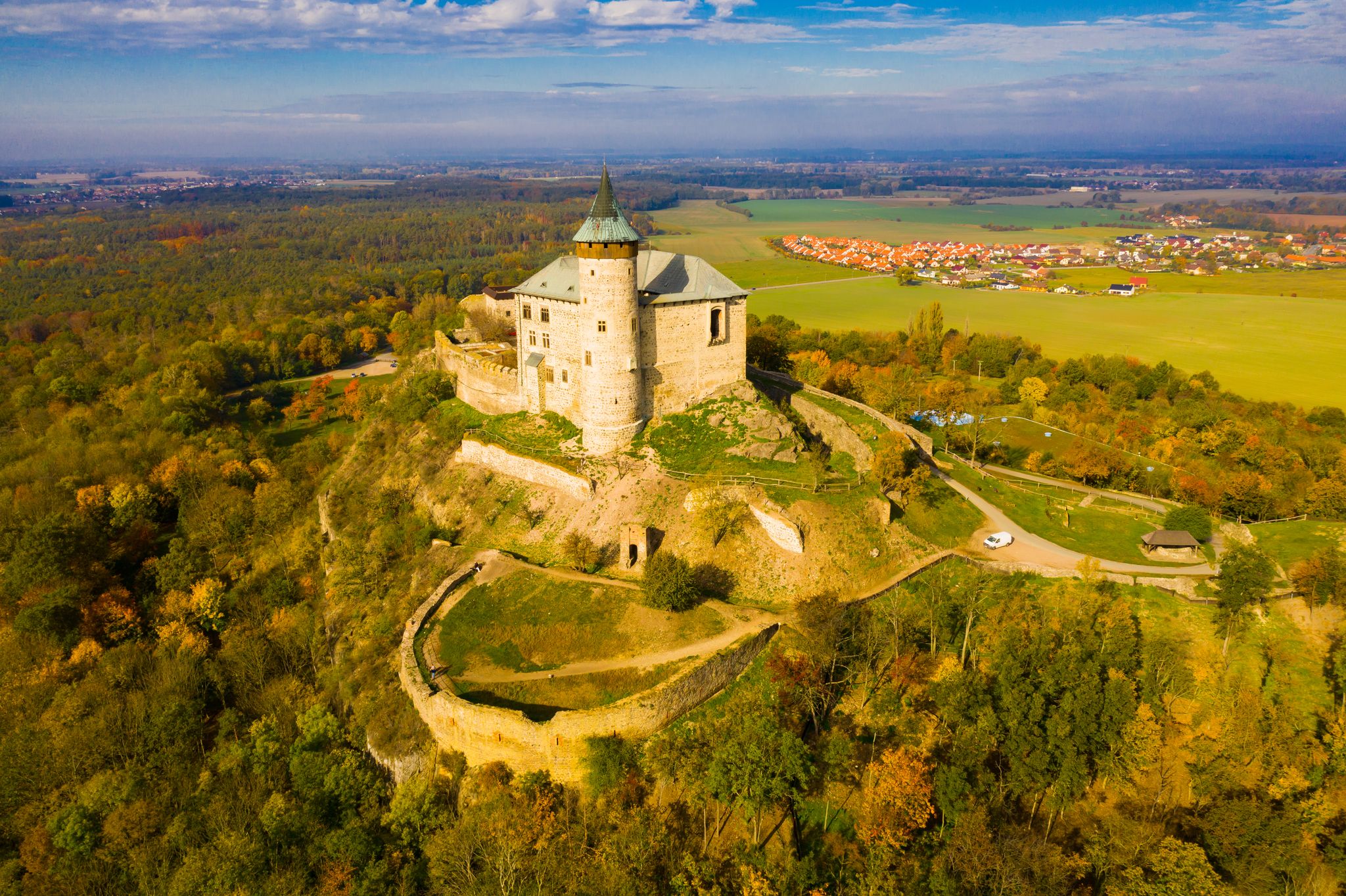 Photo of aerial view of Kunetice Mountain Castle, Raby, Czech republic.