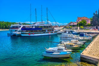 Scenic view at marble marina in Starigrad ancient roman town, Hvar island tourist resort. / Selective focus.