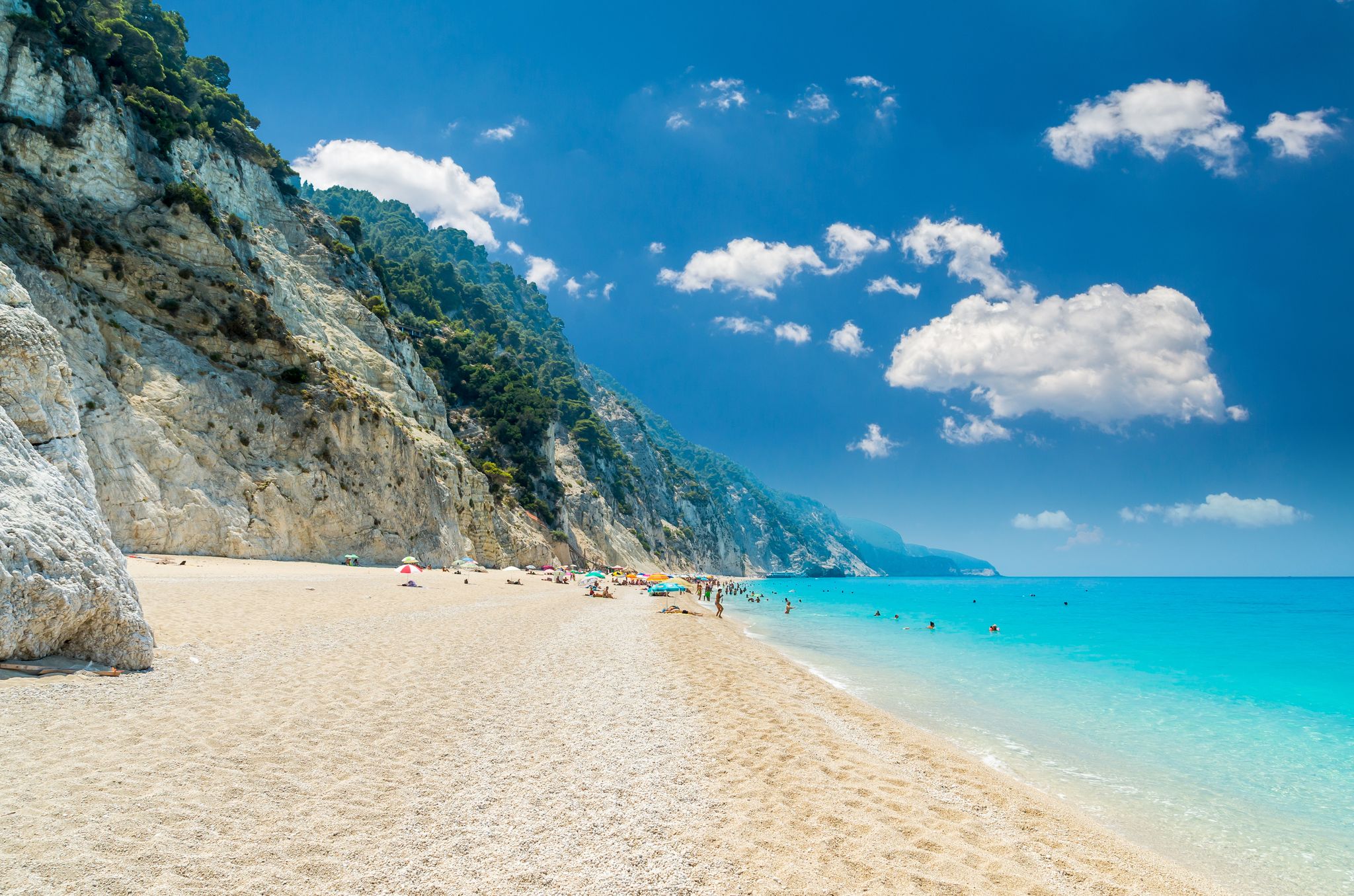 PHOTO OF Egremni beach, Lefkada island, Greece. Large and long beach with turquoise water on the island of Lefkada in Greece .