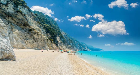 PHOTO OF Egremni beach, Lefkada island, Greece. Large and long beach with turquoise water on the island of Lefkada in Greece .